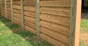 protect your wood fence from weathering and rot